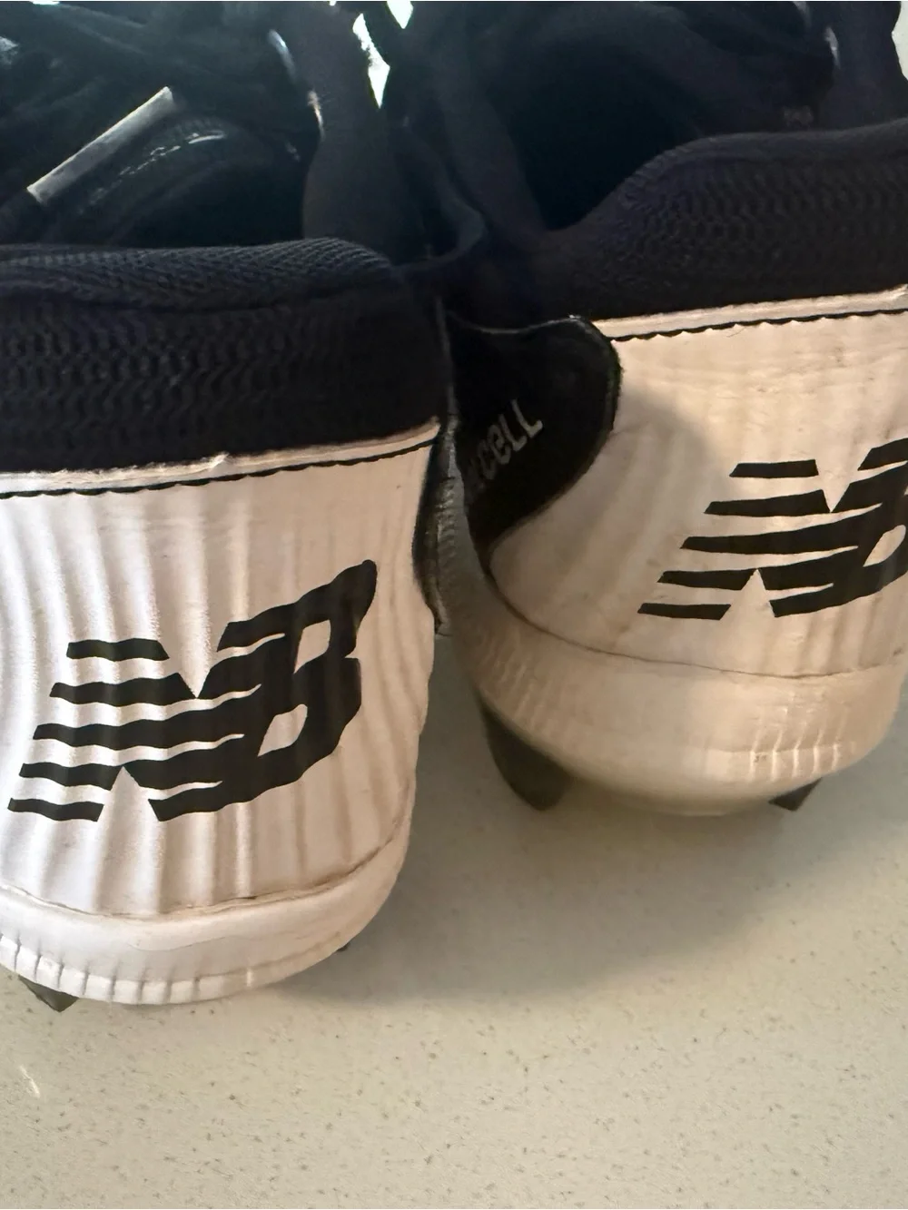 Black NB Cleats with White Insole Lettering great shape like new size M 8.5 W 10